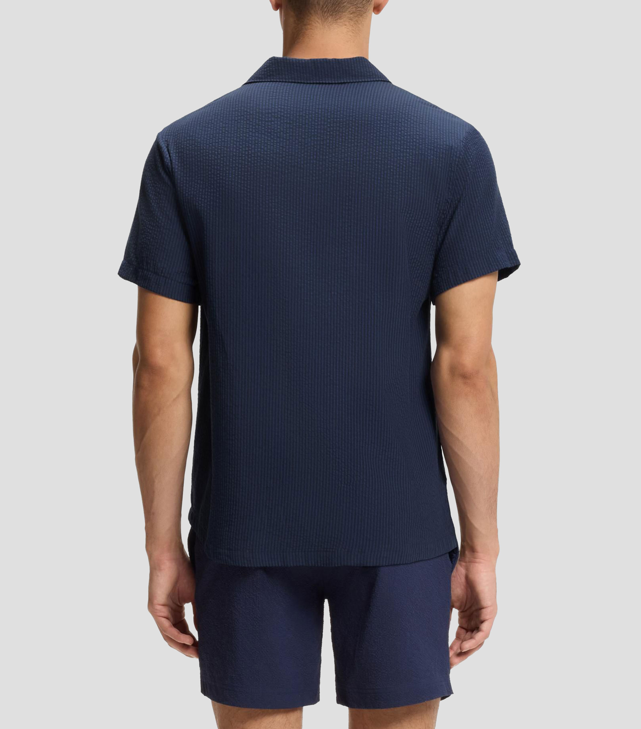 Camisa regular fit en tejido de sirsaca Hombre